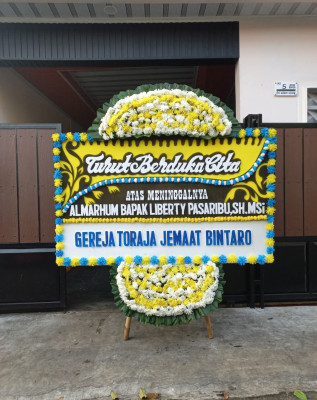 Papan Bunga Duka di Purwanegara